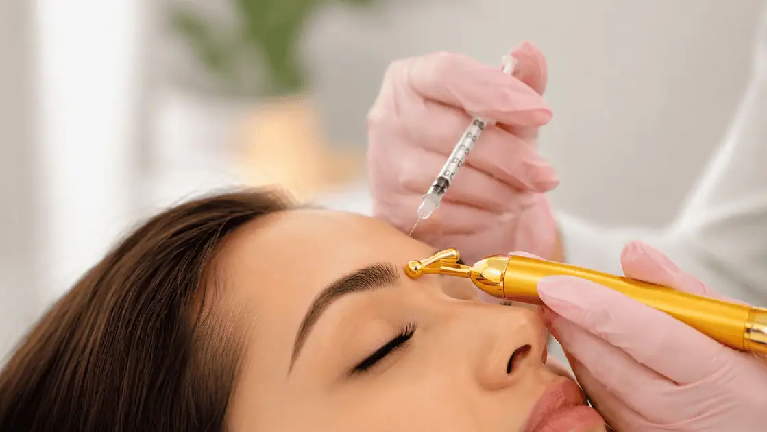 Close-up of a provider performing a Botox for Fine Lines treatment to soften forehead expression lines in a clean medical spa setting.